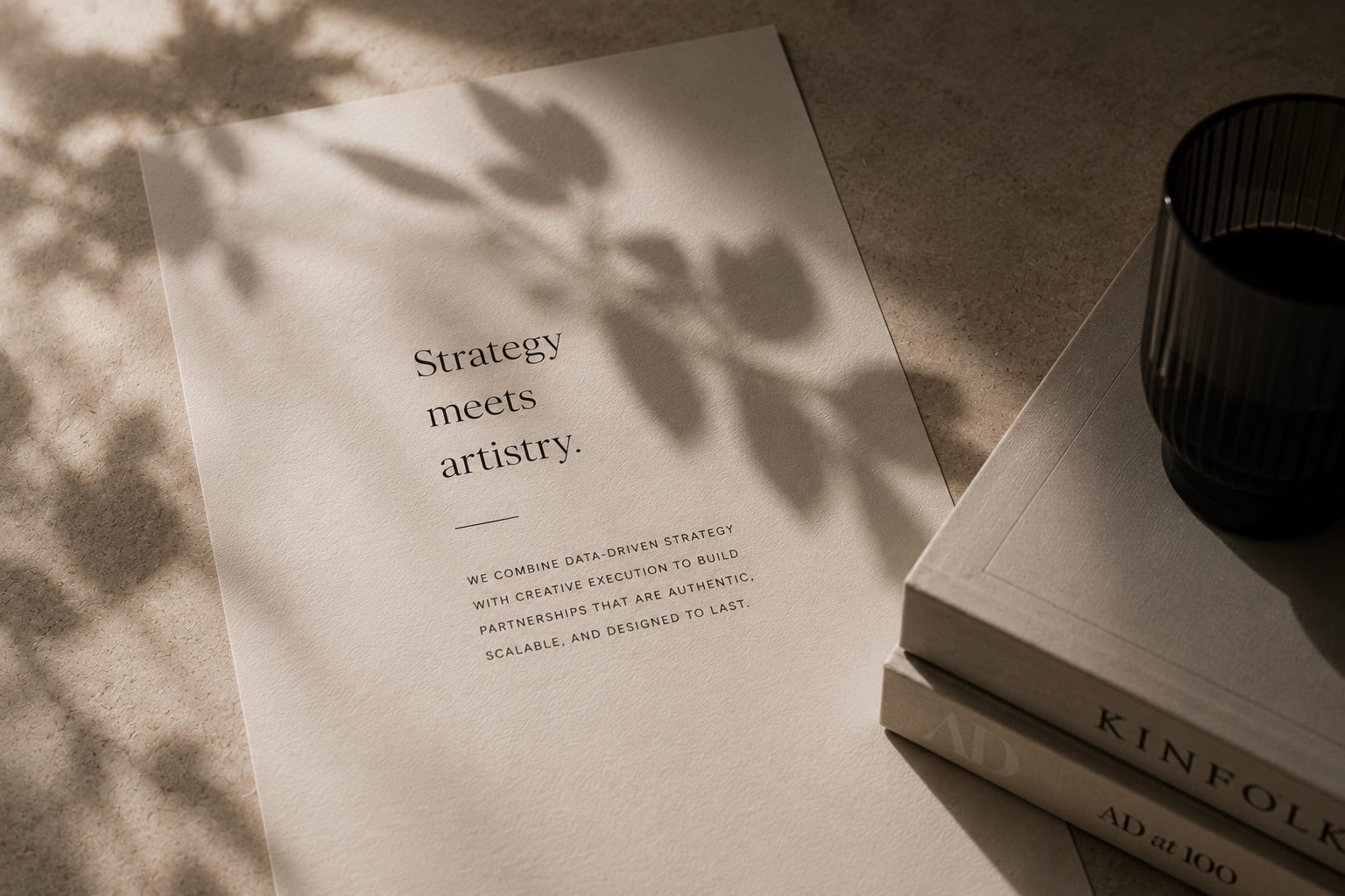 Strategy meets artistry — brand strategy document with natural light